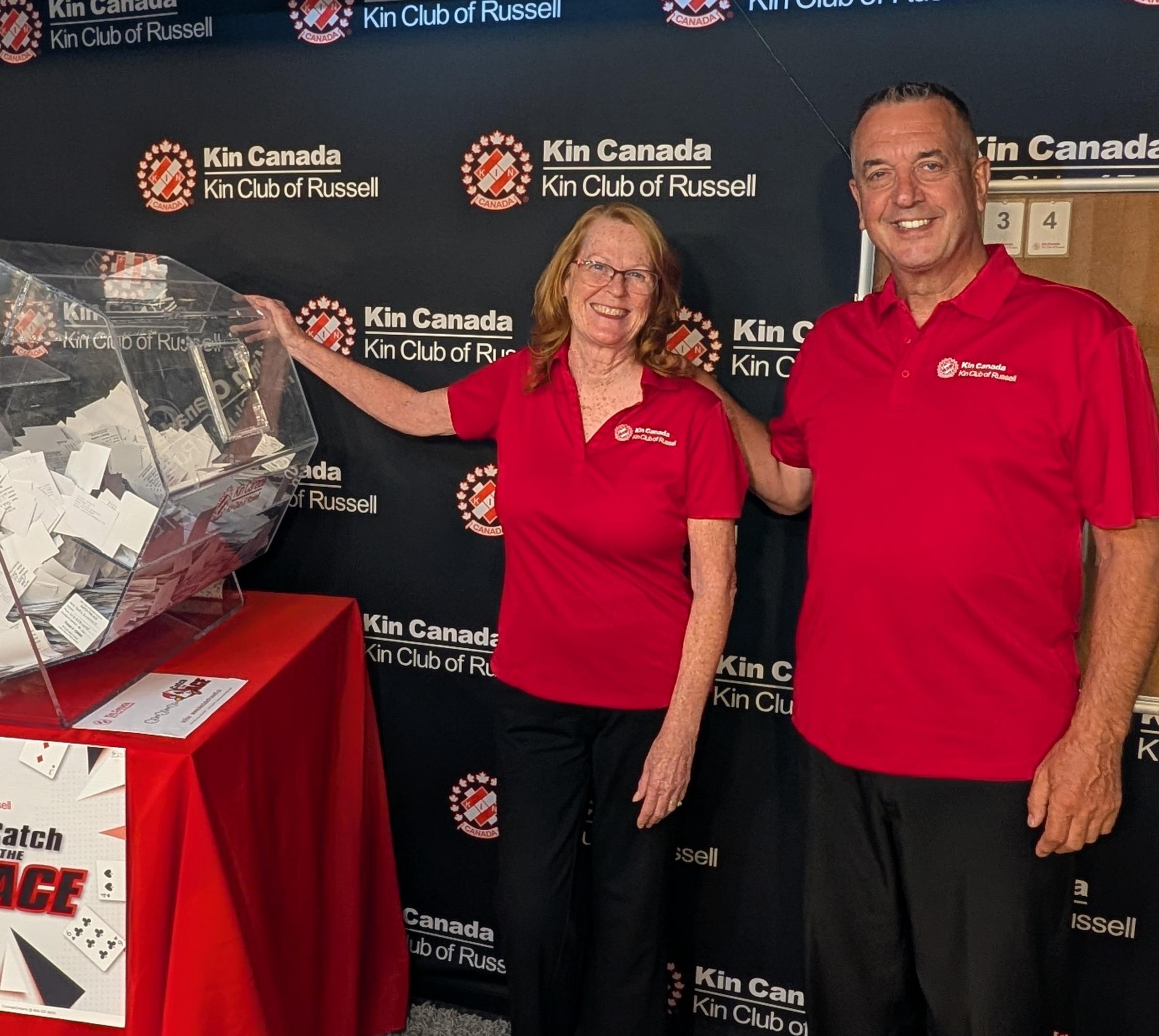 Volunteers running Catch the Ace lottery